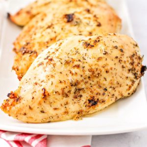 Filets de poitrines de poulet désossées assaisonnées 5oz FIL005 14 pqts x 2 Emballées sous film de plastique rétractable